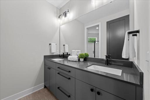 Two of these bedrooms share this bathroom
