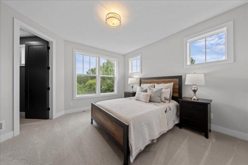 bedroom 3 to the left of the loft. All bedrooms have walk-in closets and all bedrooms are spacious