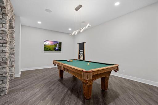 This Billiard room is also wired for a golf simulator; the room is large enough to accommodate both at the same time