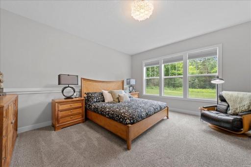 5th bedroom is located in the lower level; It has its own private bathroom and a walk-in closet