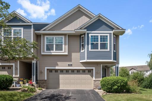 Front view of the property which is a corner unit.