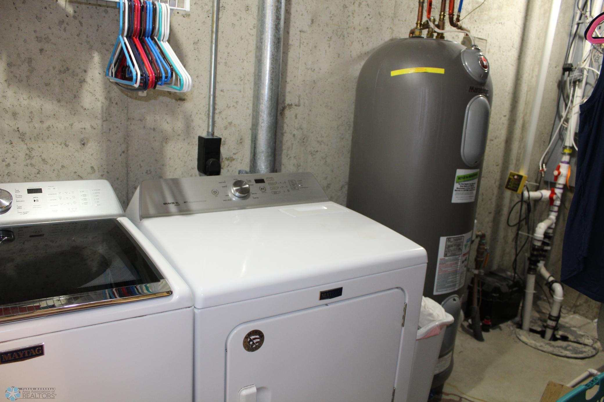 Utility-W/D included, marathon water heater, battery backup sump