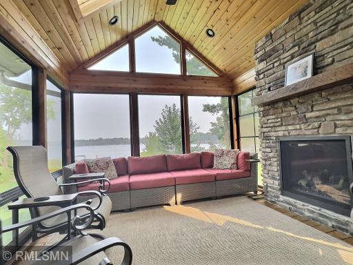 The four-season porch, professionally built in 2019, features Easy Breeze windows and a gas fireplaceâallowing you to enjoy the outdoors from the comfort of indoors year-round.