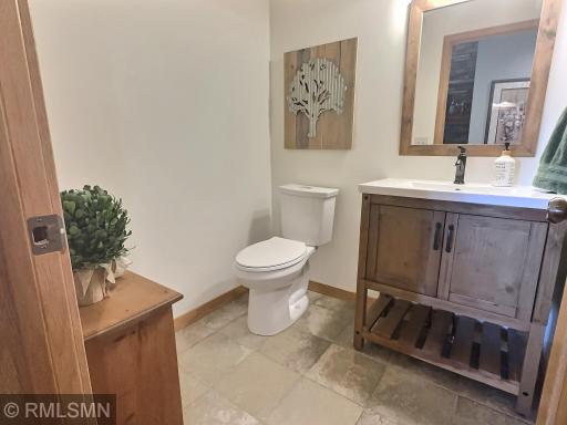 A convenient powder room is located on the main floor, just off the living room.