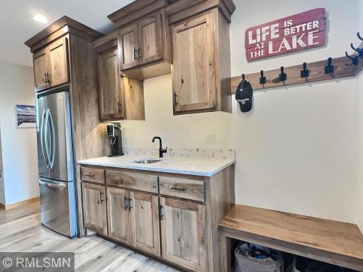 Come right in from the lake, hang your wet towels on the convenient hooks, and enjoy a cold drink.
