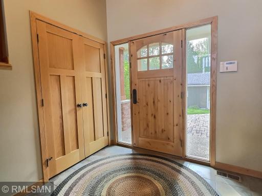 Spacious and welcoming, this entryway warmly invites friends and family into your home.