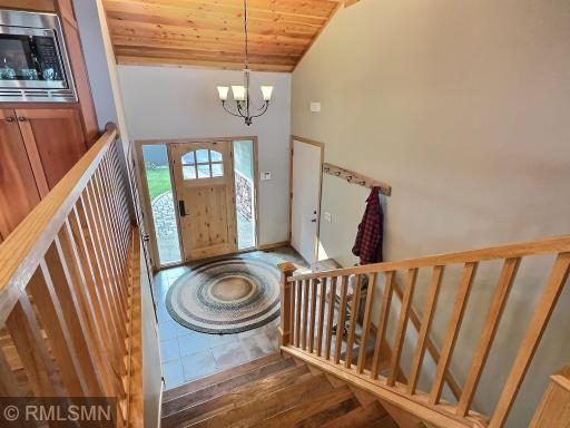 Convenient ceramic tile flooring in the foyer makes cleaning up messes a breeze. A large coat closet provides ample space for all the extra outerwear Minnesotans need. Plus, the attached three-car garage connects directly to the foyer for easy access