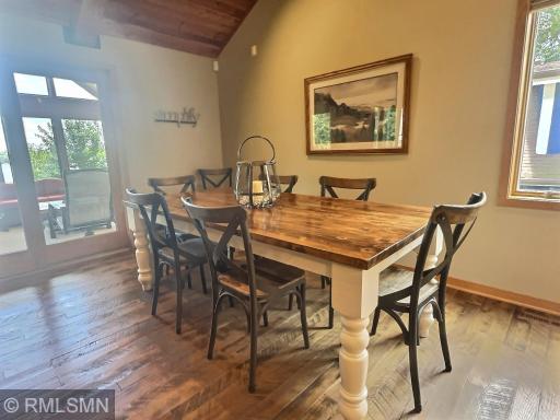 The eat-in dining room offers lovely lake views through the porch