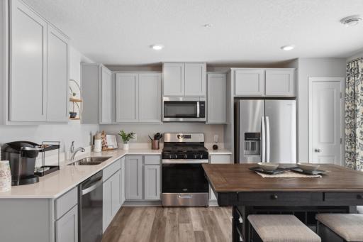 Model home ( Actual home has white cabinets)