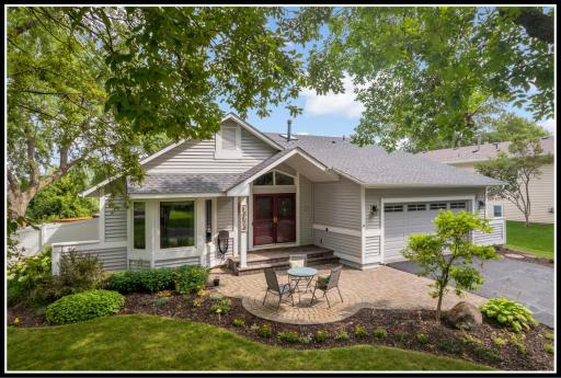 Modified two-story on a flat lot backing up to nature preserve