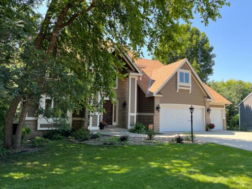 Beautiful 2 story home on a heavily wooded and fenced walkout lot in the demand Summit Oaks neighborhood