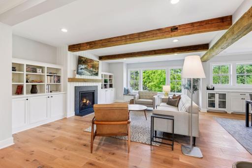 Livning room fills with natural light from the large windows