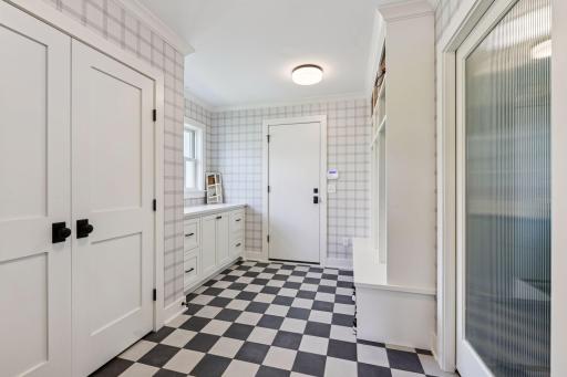 Mudroom with lockers, drop station and closet