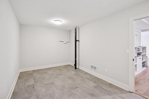 Lower level space perfect for work out room, 2nd office, craft room, playroom