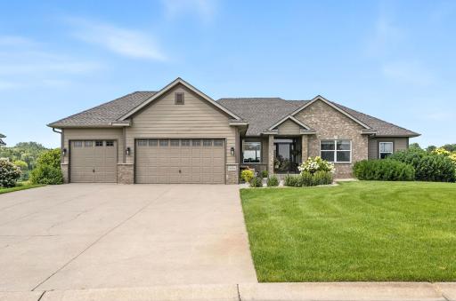 Immaculate curb appeal! This beautiful single-story home features a blend of brick and siding with timeless architectural details. The extended concrete driveway is perfect for additional parking and easy maneuverability.