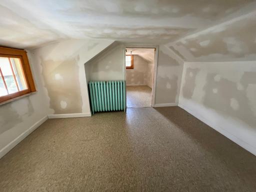 Ready for your ideas - this would be a great bedroom + additional living area, bedroom, office or nursery.