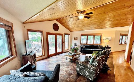 Upper Living room with fireplace and lake views.jpg