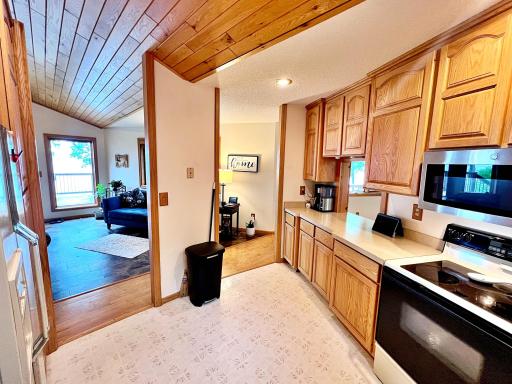 Kitchen Views to Living room and Farm Island Lake.jpg
