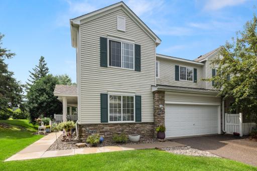 End Unit with wrap around side walk to entrance.