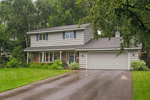 Very spacious, beautiful maintained, New Brighton Two-Story on a spectacular, private treed lot! Beautiful cedar siding, new roof and refinished driveway. Extra parking for guests in this long driveway.