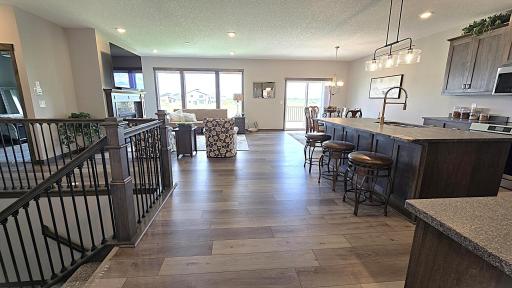Fantastic gathering space in this open concept designed kitchen, dining room, great room.