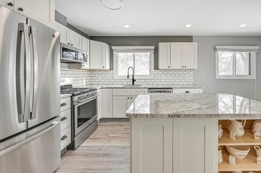 Updated kitchen with granite and stainless