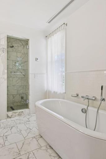 With sumptuous, spa-like bath!