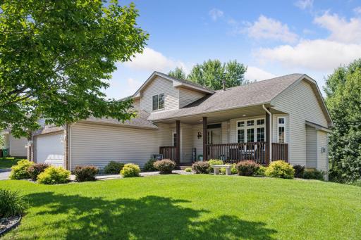 Welcome home to this beautifully landscaped 5 bedroom / 4 bathroom home with an inviting front porch!