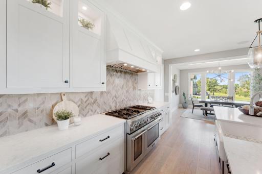 Thermador appliances include six burner stove and double oven