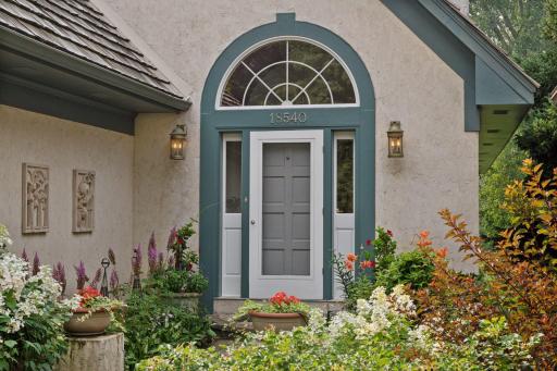 Beautiful gardens welcome you to the front door
