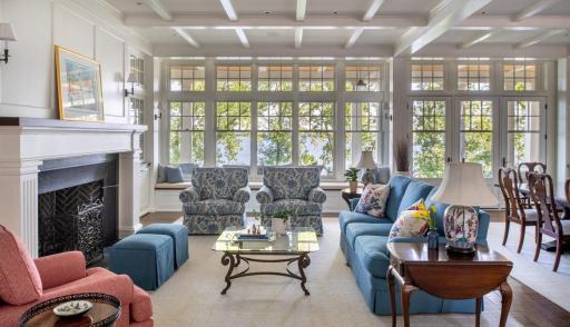Natural light, layered textures, and a layout that invites conversation—this family room is equal parts comfort and style. Photo of a living room designed and built by BCD Homes