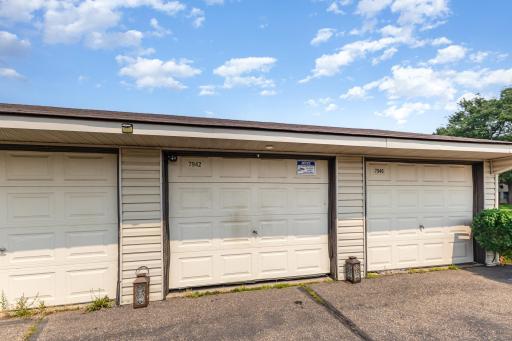 Garage 7942 Yates Ave N + 1 designated parking spot elsewhere.