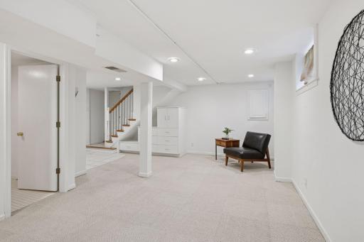 Add an egress window and a doorway for a lower level bedroom suite!