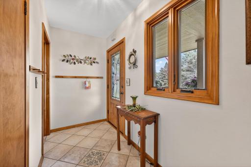 Upon entering the spacious foyer, you step upon a stylish ceramic tiled floor.