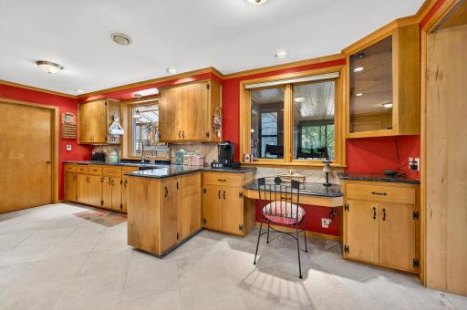 There's no lack of cabinet space in this elegantly appointed kitchen..