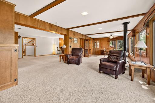 This perspective shows the living room transition to the informal dining room.