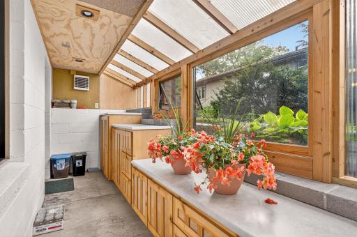 South-facing windows flood the room in nourishing sunlight for your plants.