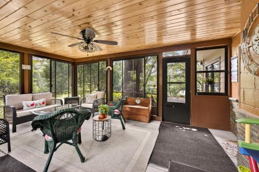The structure sits upon a maintenance-free Trex decking and the door opens to a large patio.