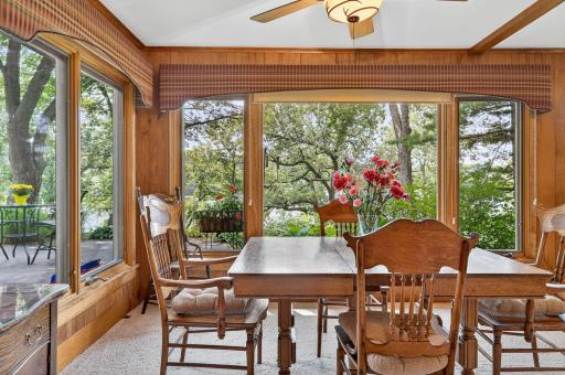Looking out to the west, the backyard has towering white oak trees providing shade from their expansive canopies.
