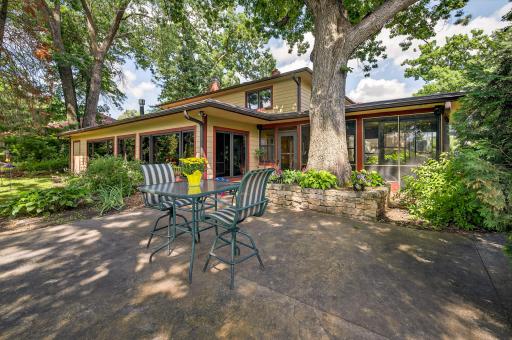 Summertime lunches are so pleasant sitting on the 456 square foot stamped concrete patio, shaded by a massive white oak tree.