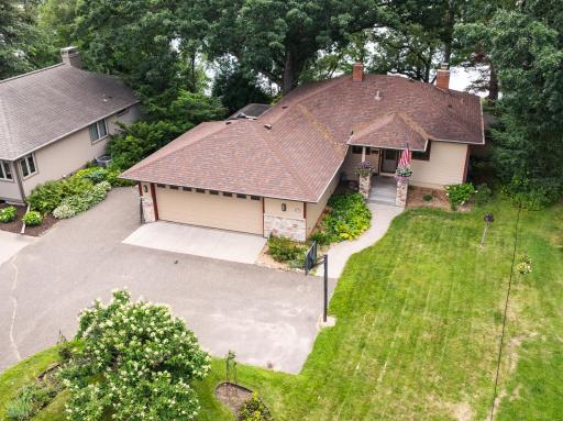 The attached two car garage measures 624 square feet. In 2018, the homeowner had a Polyaspartic coating applied to the garage floor, offering excellent durability against abrasions and stains.