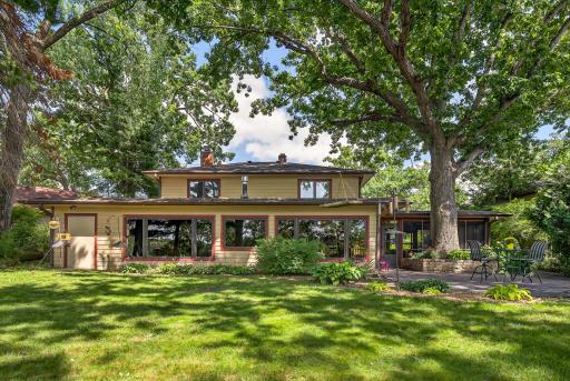 Enjoy the beauty of this lush, wooded backyard looking out from this bank of Marvin metal-clad windows to the west toward Lily Lake. Conveniently located just 2 miles from the historic downtown of Stillwater.