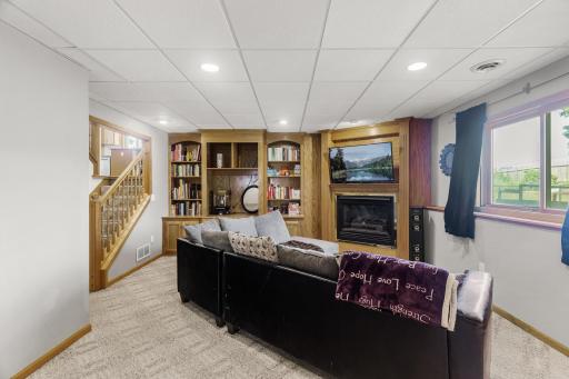 Lower level family room with gas fireplace