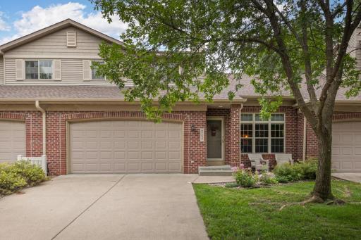 Tucked away on a quiet private cul-de-sac in the heart of Eden Prairie, this picturesque and charming townhome is the perfect blend of comfort, space, and serene living.