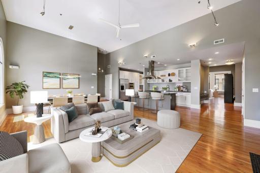 View of Living room looking back towards dining room, Remodeled Kitchen & Foyer entrance (virtually staged image)