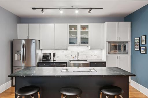 Kitchen with New center island, custom lower cabinets, Soap Stone Countertops, & SS appliances (w/ new dishwasher & Range)!