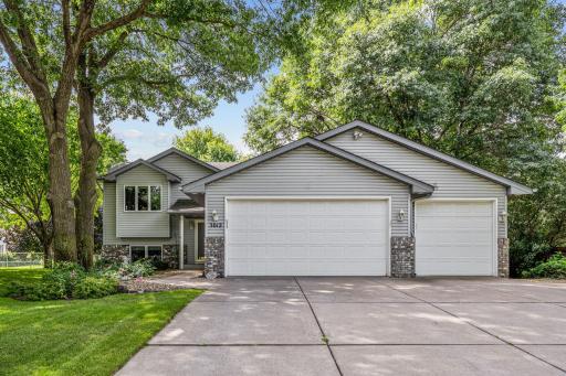 Delightful custom built immaculate home inside & out. Quality concrete driveway and lush landscaping and towering shade trees. Perfect for the fussiest of buyers!
