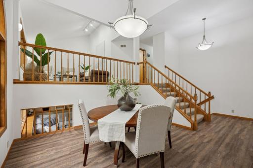 Bright entryway welcomes guests with warmth and grandeur.