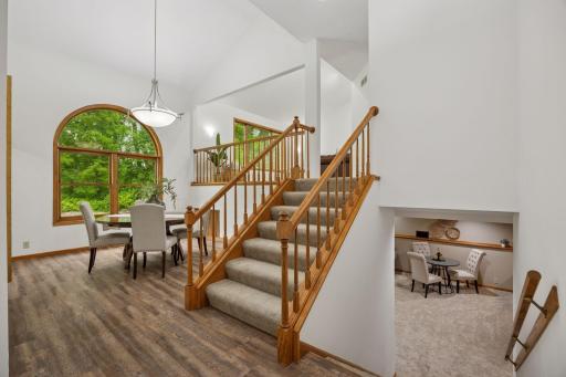Step into a sun-filled, open-concept foyer with sleek modern finishes.