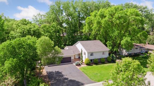 Welcome to your private oasis in prestigious Mendota Heights! Plenty of storage in the attached 3-car garage.